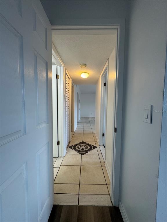 8213 Sun Spring Circle, Unit 61 Orlando, FL 32825 - Photo 24 of 44 a view of a hallway