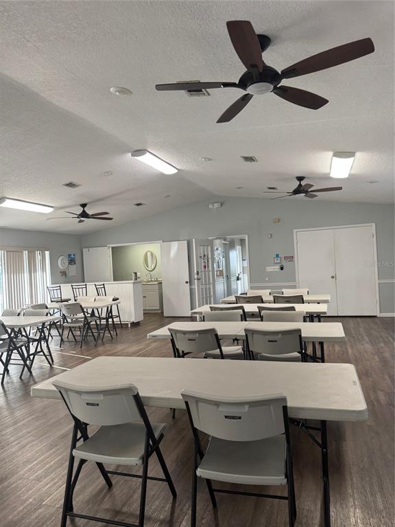 8213 Sun Spring Circle, Unit 61 Orlando, FL 32825 - Photo 39 of 44 a kitchen with a table and chairs in it