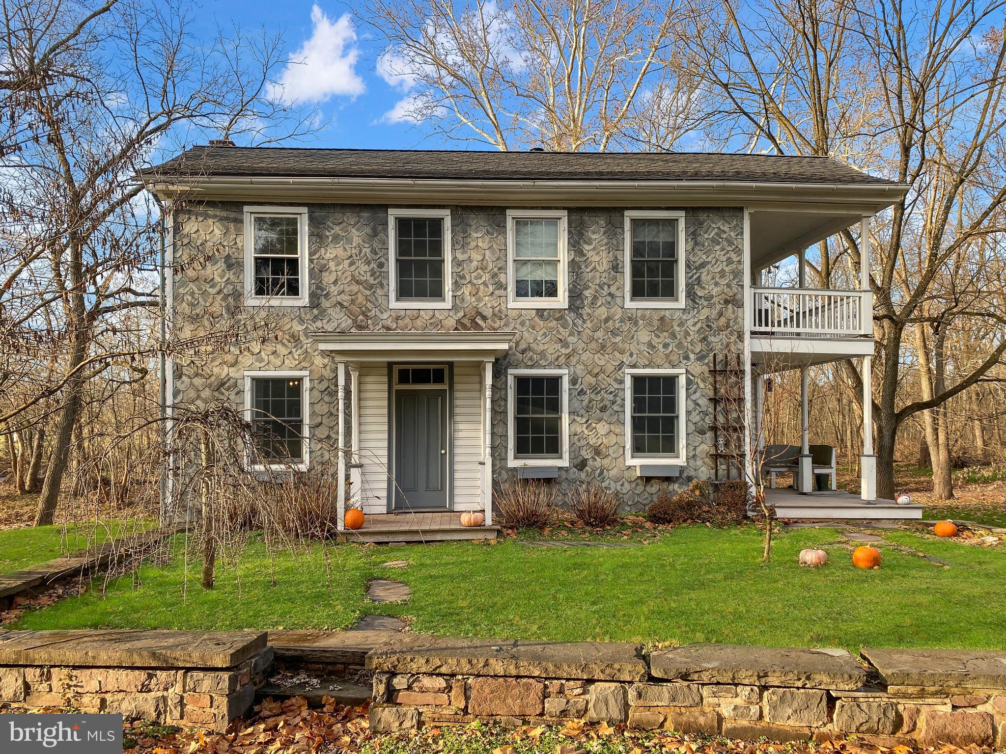 589 Groffs Mill Road Harleysville, PA 19438 - Photo 2 of 14 a front view of a house with a garden