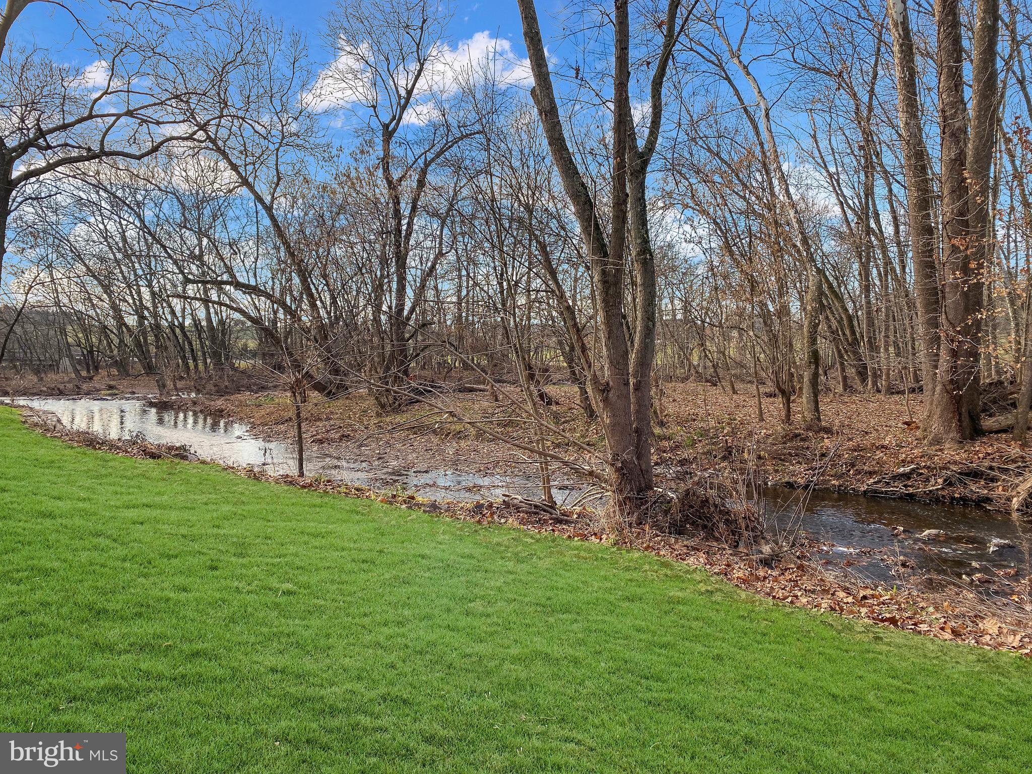 589 Groffs Mill Road Harleysville, PA 19438 - Photo 13 of 14 a backyard of a house with lots of green space