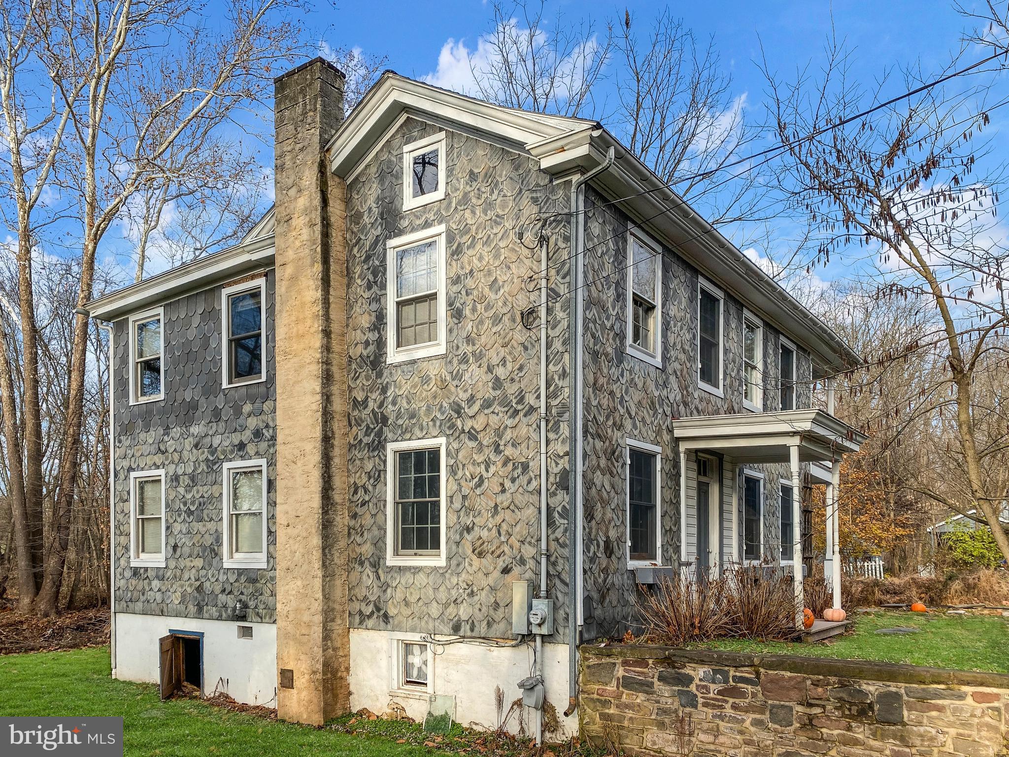 589 Groffs Mill Road Harleysville, PA 19438 - Photo 3 of 14 a front view of a house with a yard