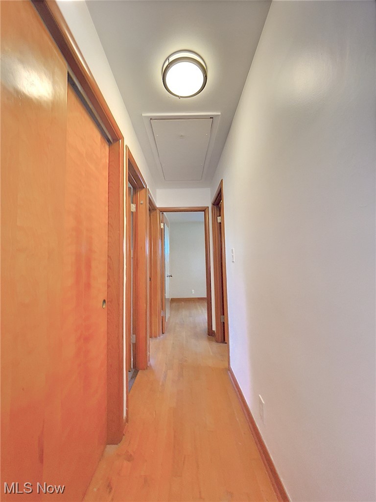 24000 Knickerbocker Road Bay Village, OH 44140 - Photo 12 of 27 Corridor with hardwood flooring