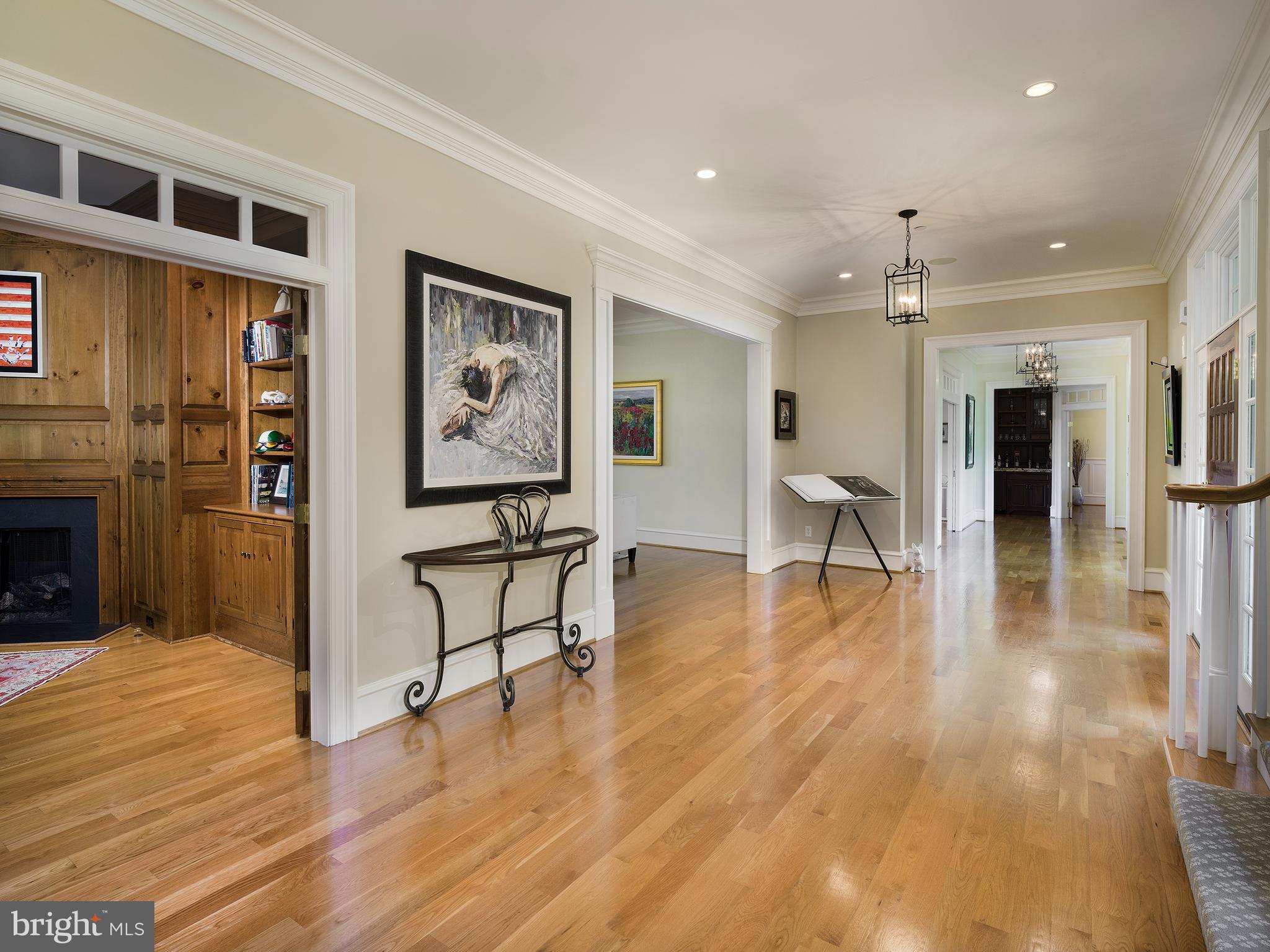 102 Springhouse Lane Newtown Square, PA 19073 - Photo 13 of 80 a view of a livingroom with furniture wooden floor and a fireplace