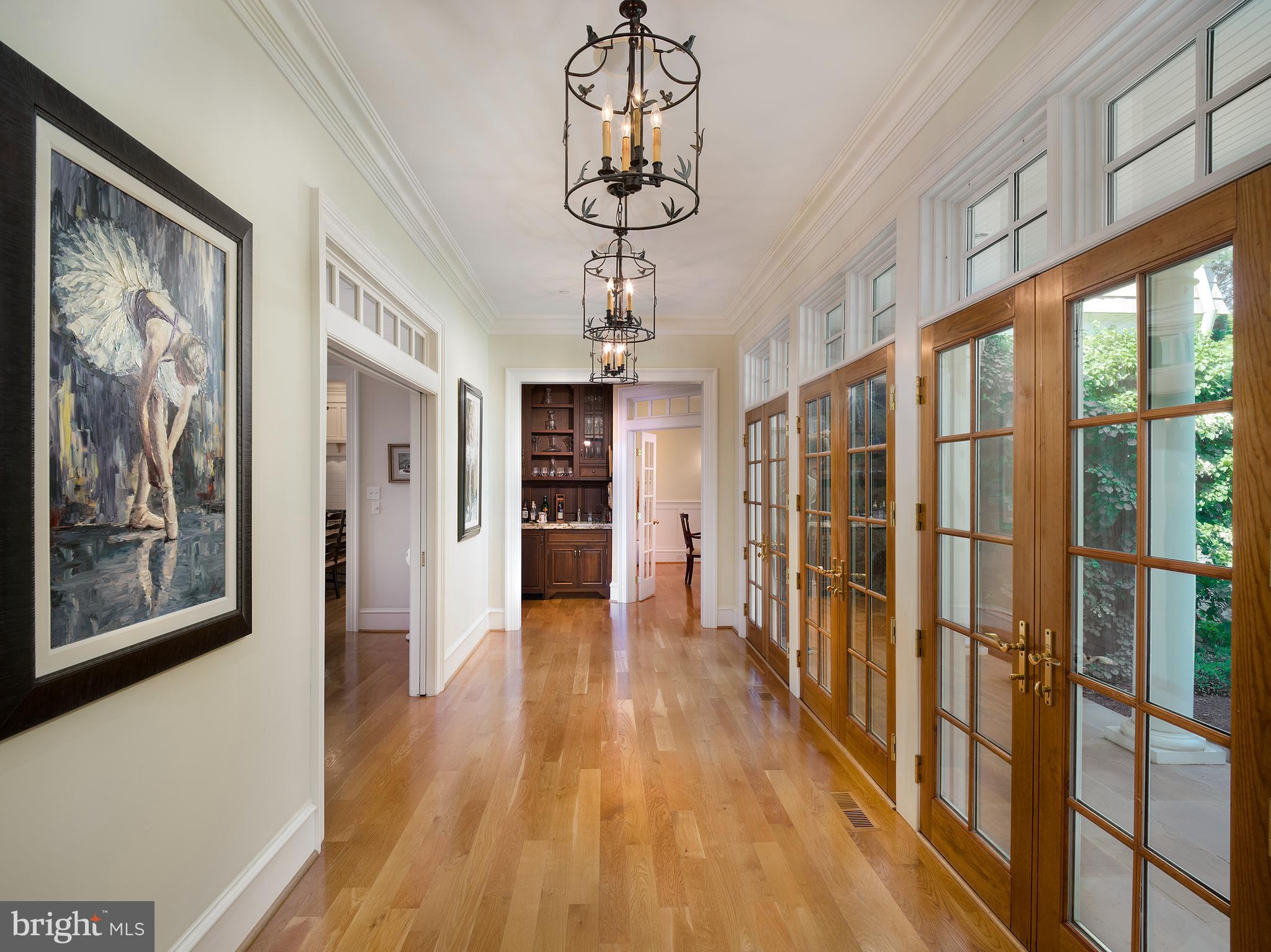 102 Springhouse Lane Newtown Square, PA 19073 - Photo 14 of 80 a view of a hallway with wooden floor and staircase