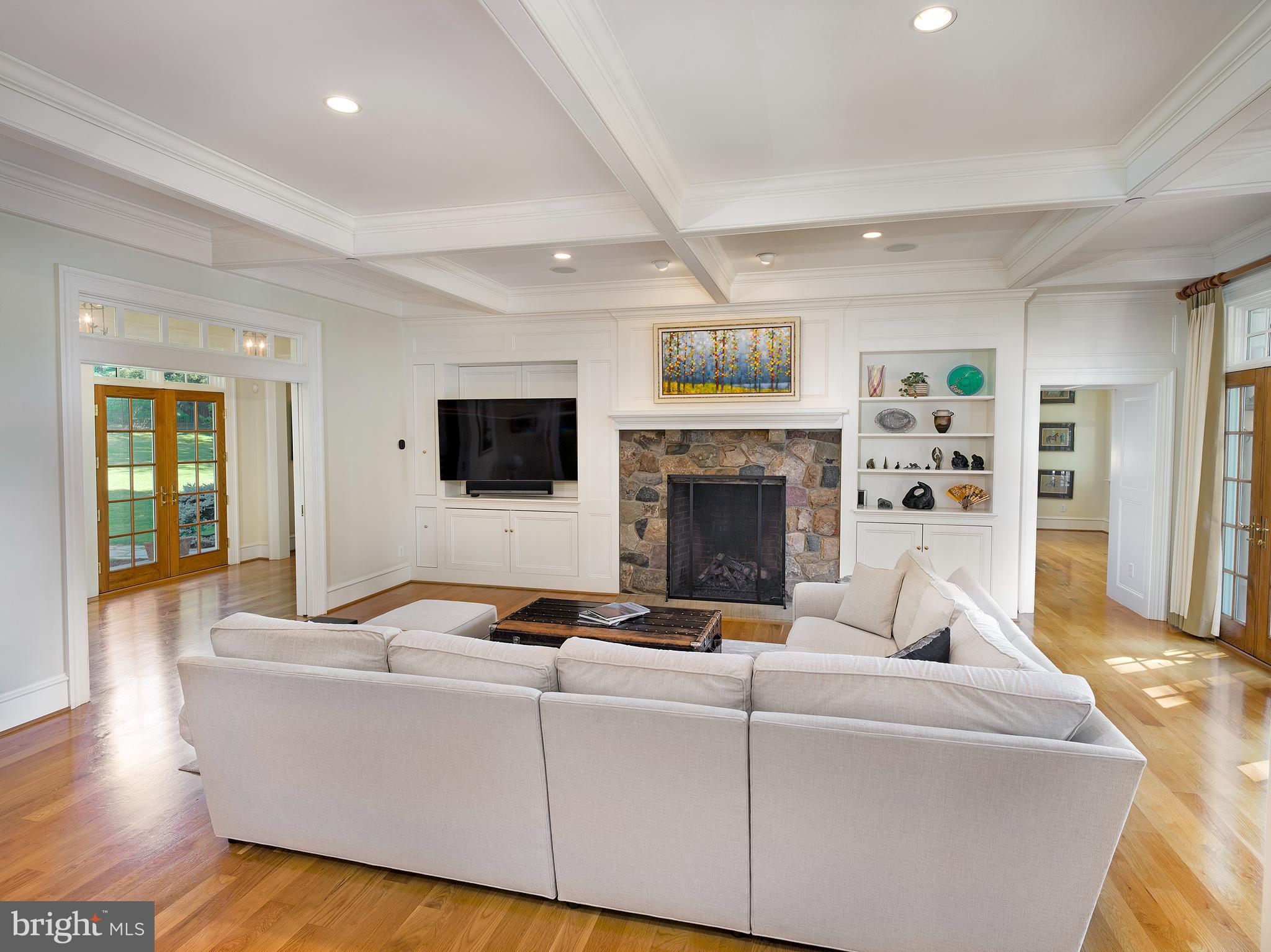 102 Springhouse Lane Newtown Square, PA 19073 - Photo 17 of 80 a living room with furniture and a fireplace