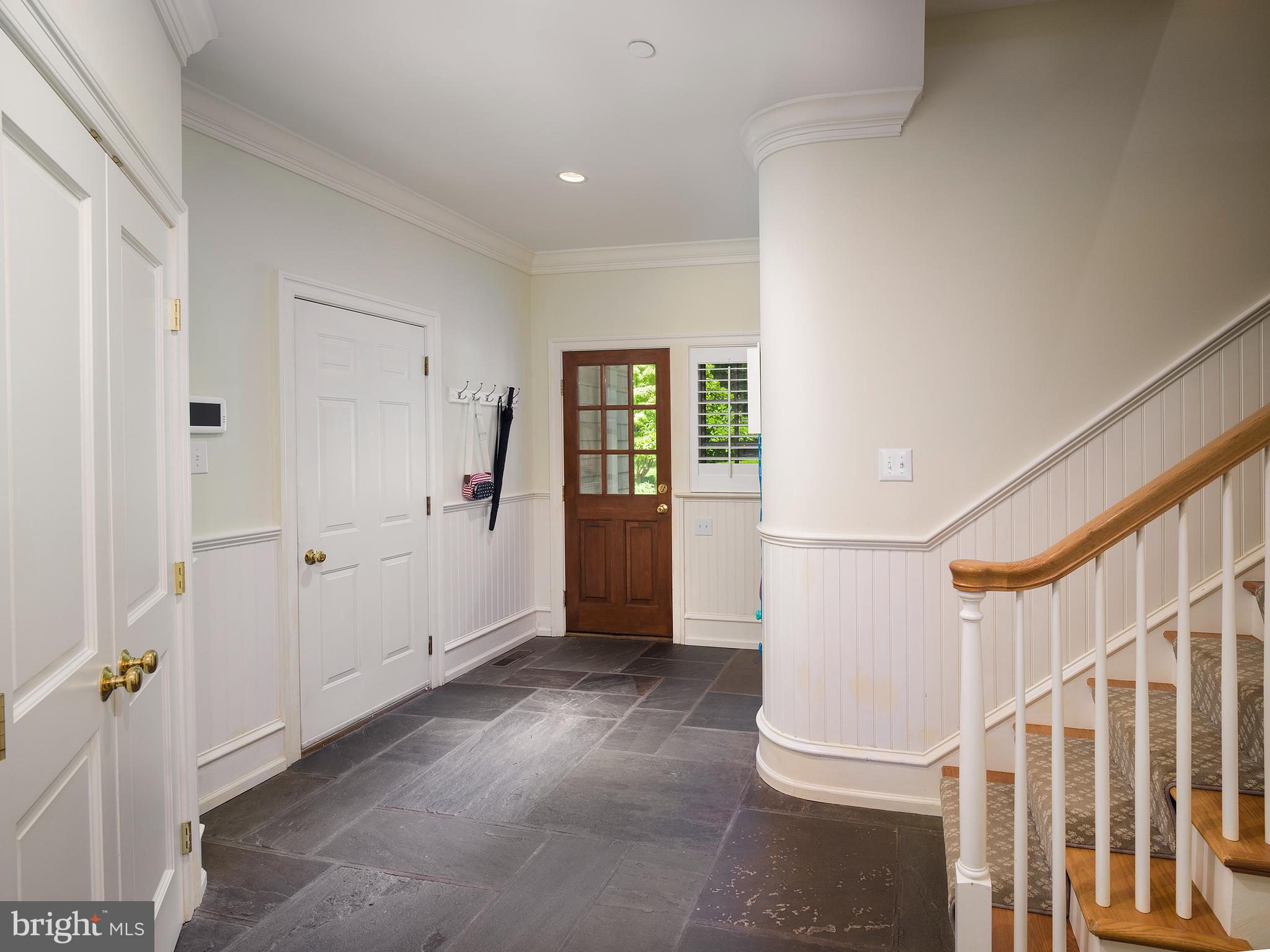 102 Springhouse Lane Newtown Square, PA 19073 - Photo 28 of 80 a view of entryway with wooden floor and stairs