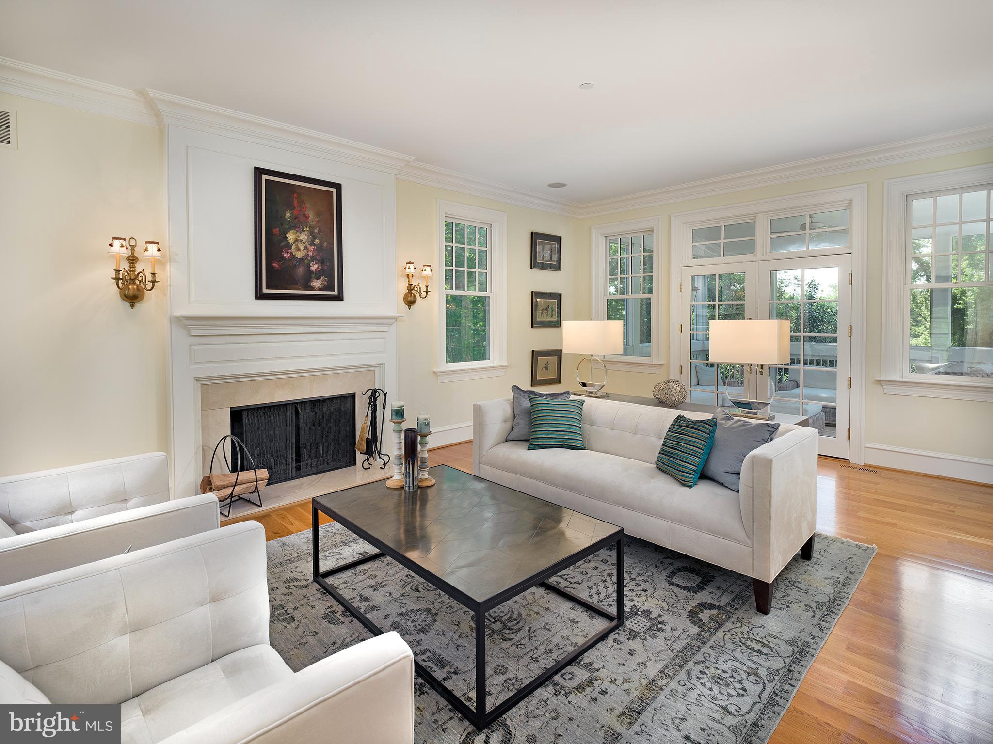 102 Springhouse Lane Newtown Square, PA 19073 - Photo 32 of 80 a living room with furniture and a fireplace