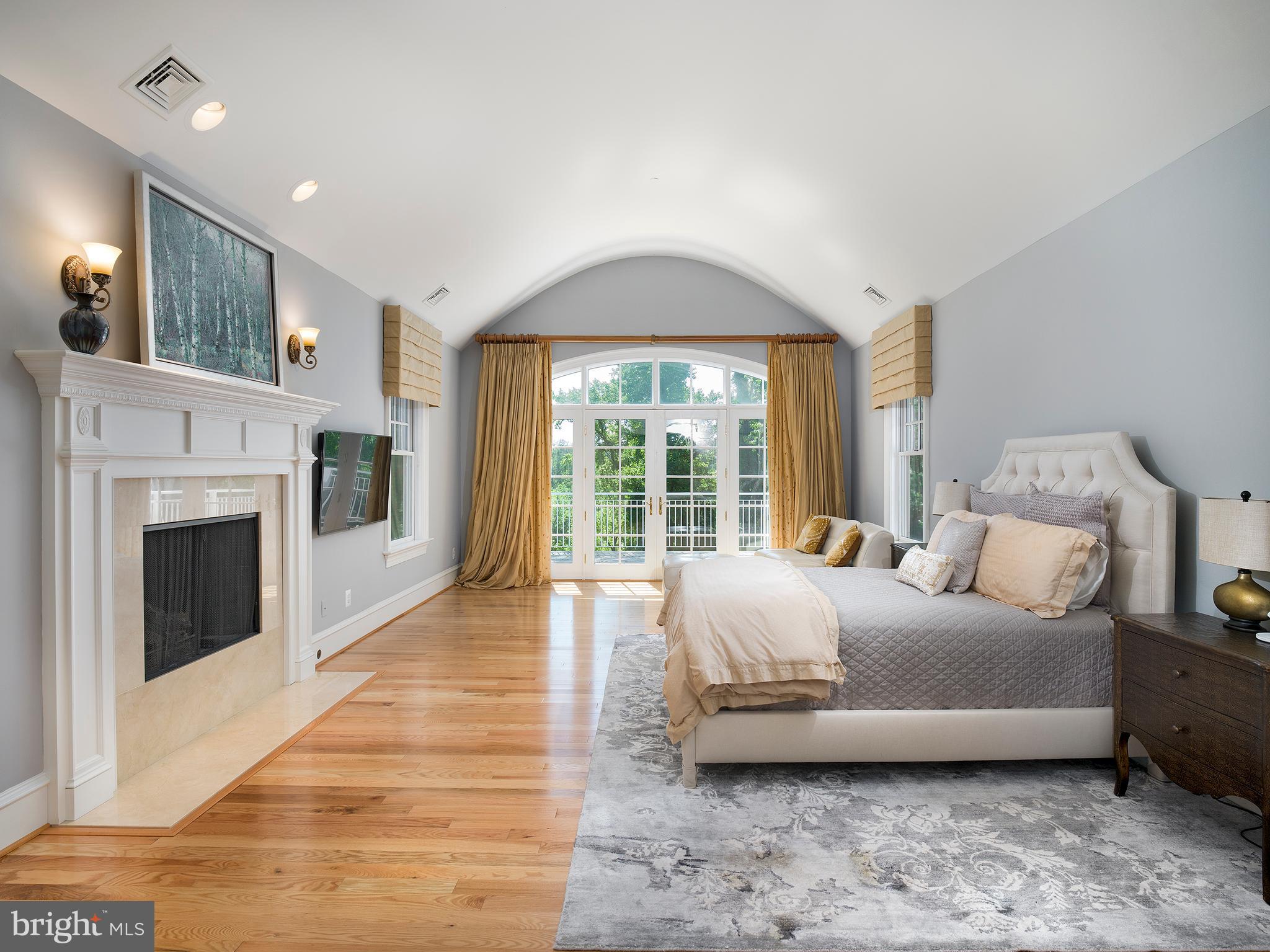 102 Springhouse Lane Newtown Square, PA 19073 - Photo 43 of 80 a living room with furniture and a fireplace