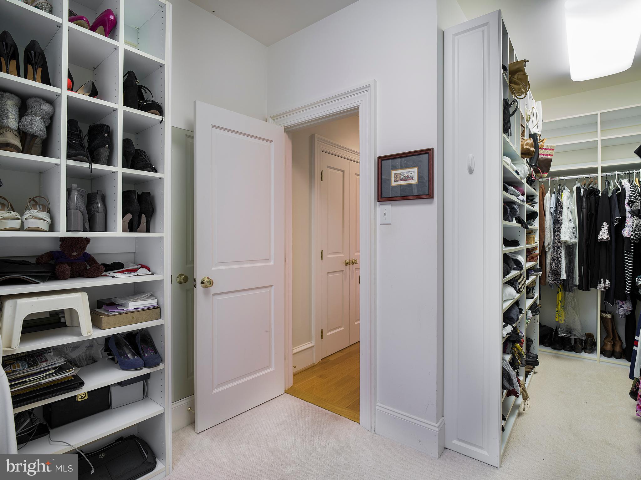 102 Springhouse Lane Newtown Square, PA 19073 - Photo 51 of 80 a view of walk in closet with clothes and shoes