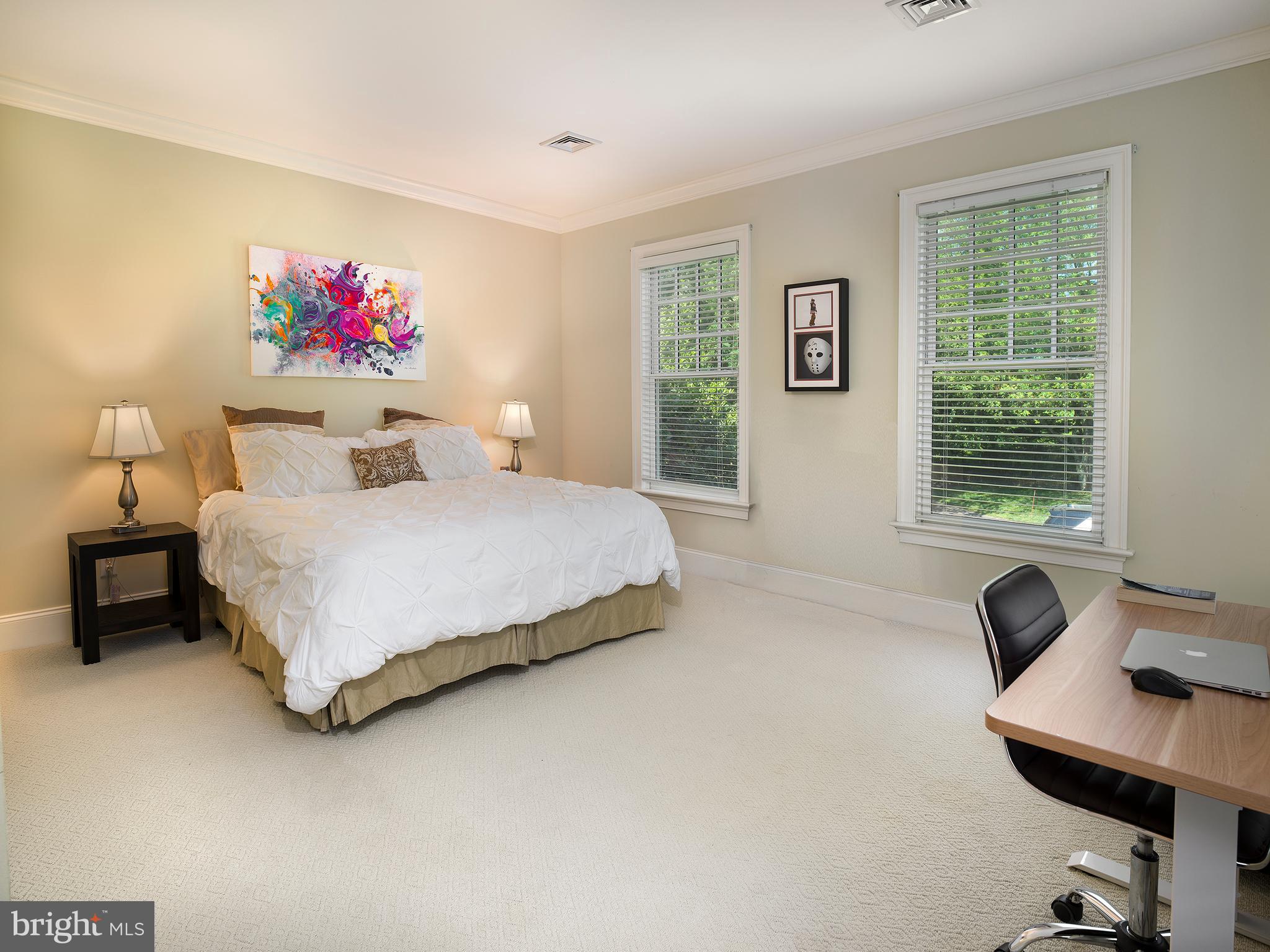 102 Springhouse Lane Newtown Square, PA 19073 - Photo 55 of 80 a bedroom with a bed a computer on desk and a dresser next to a window