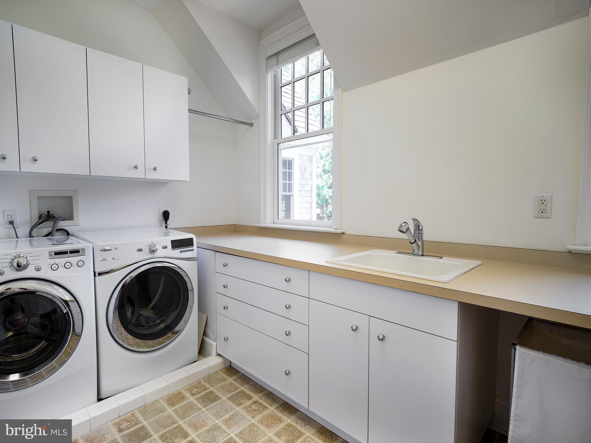 102 Springhouse Lane Newtown Square, PA 19073 - Photo 59 of 80 a utility room with sink dryer and washer