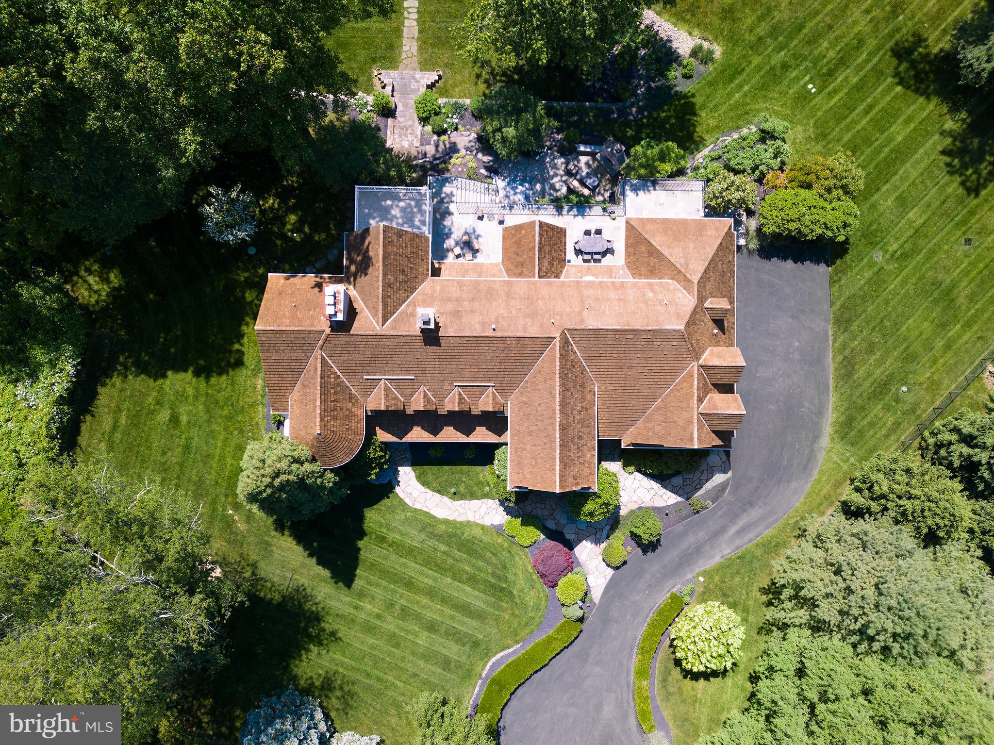 102 Springhouse Lane Newtown Square, PA 19073 - Photo 7 of 80 an aerial view of a house with yard swimming pool and outdoor seating