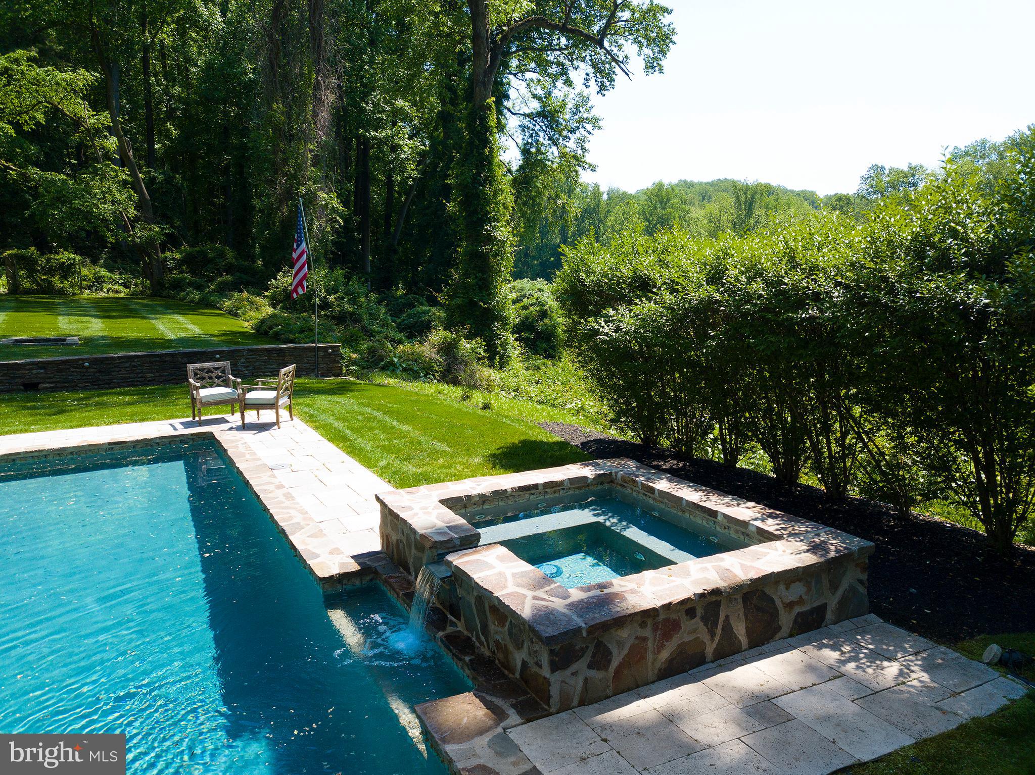 102 Springhouse Lane Newtown Square, PA 19073 - Photo 73 of 80 a view of a swimming pool with a yard and sitting area
