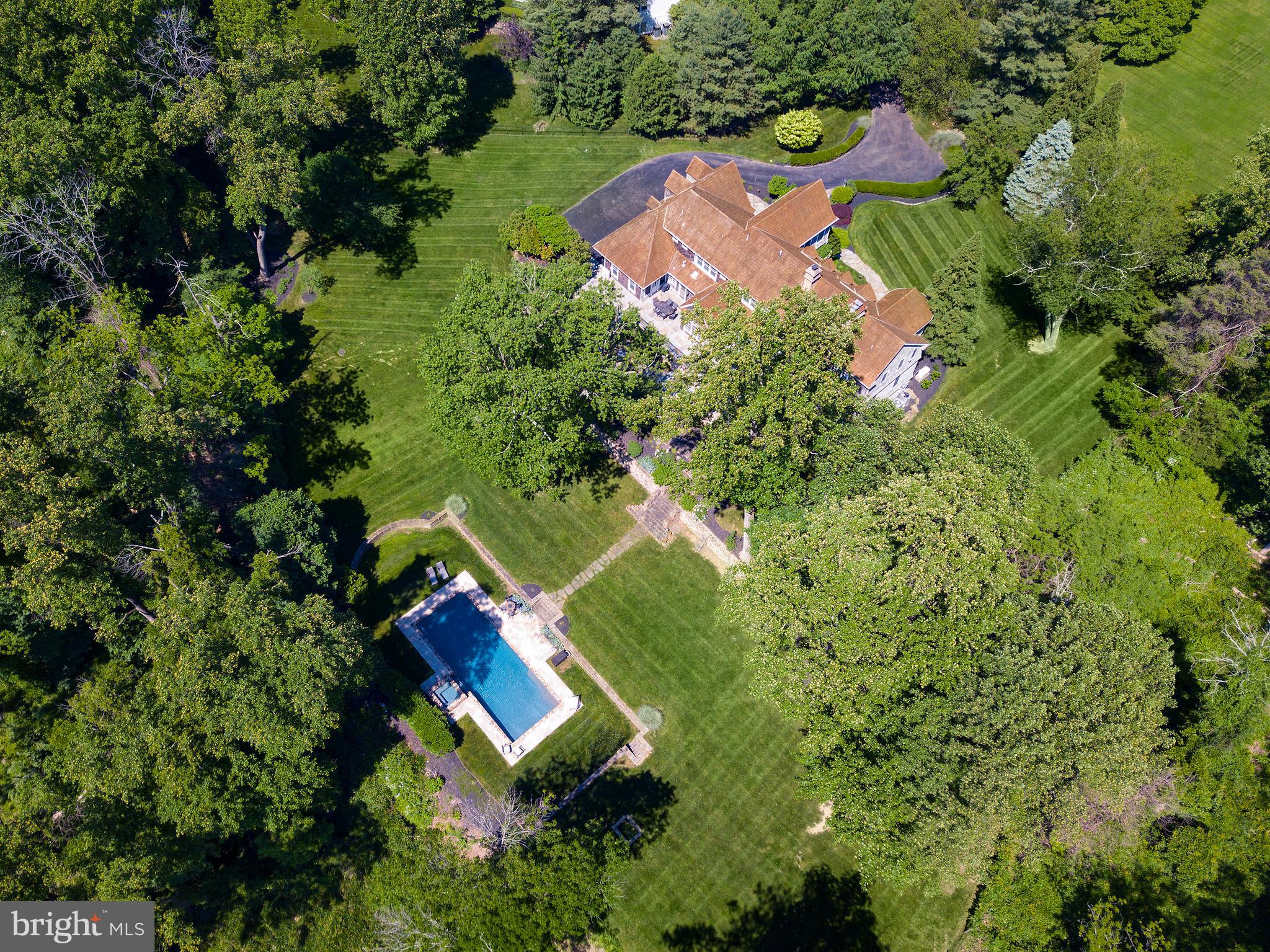 102 Springhouse Lane Newtown Square, PA 19073 - Photo 9 of 80 an aerial view of a house with outdoor space and street view