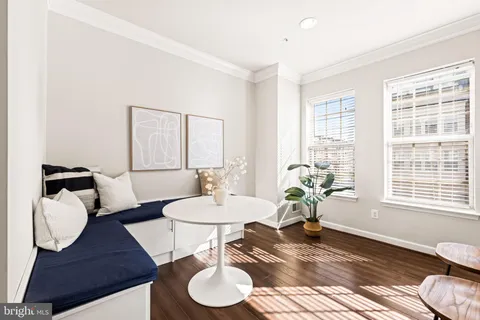 a view of entryway with wooden floor