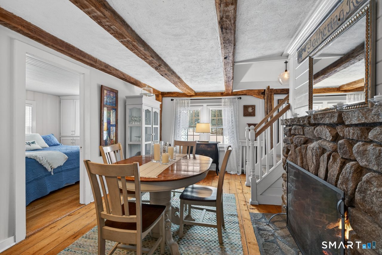 279 Roast Meat Hill Road Killingworth, CT 06419 - Photo 4 of 24 View from dining area to first floor primary bedroom.