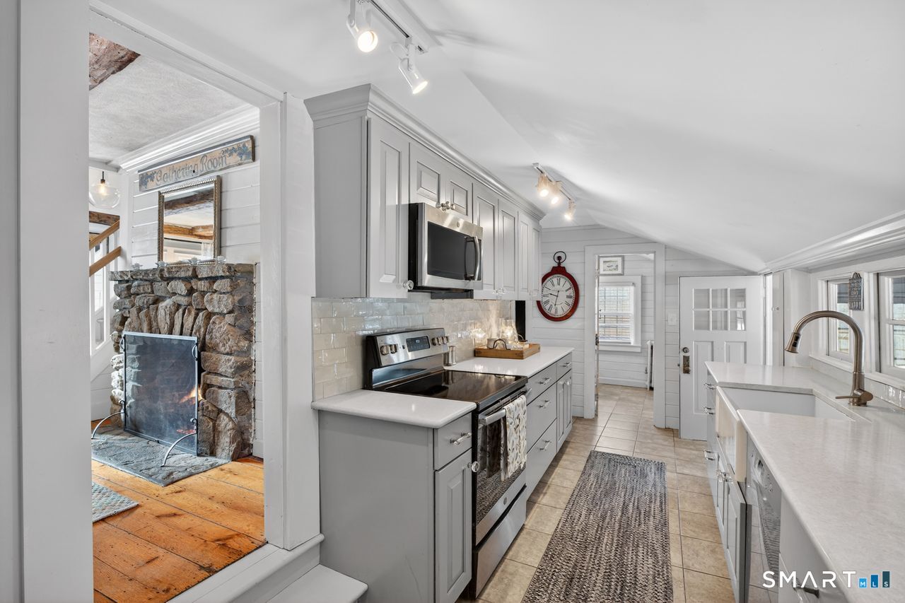 279 Roast Meat Hill Road Killingworth, CT 06419 - Photo 7 of 24 The custom kitchen with the prettiest shade of grey cabinets. Chic and functional.