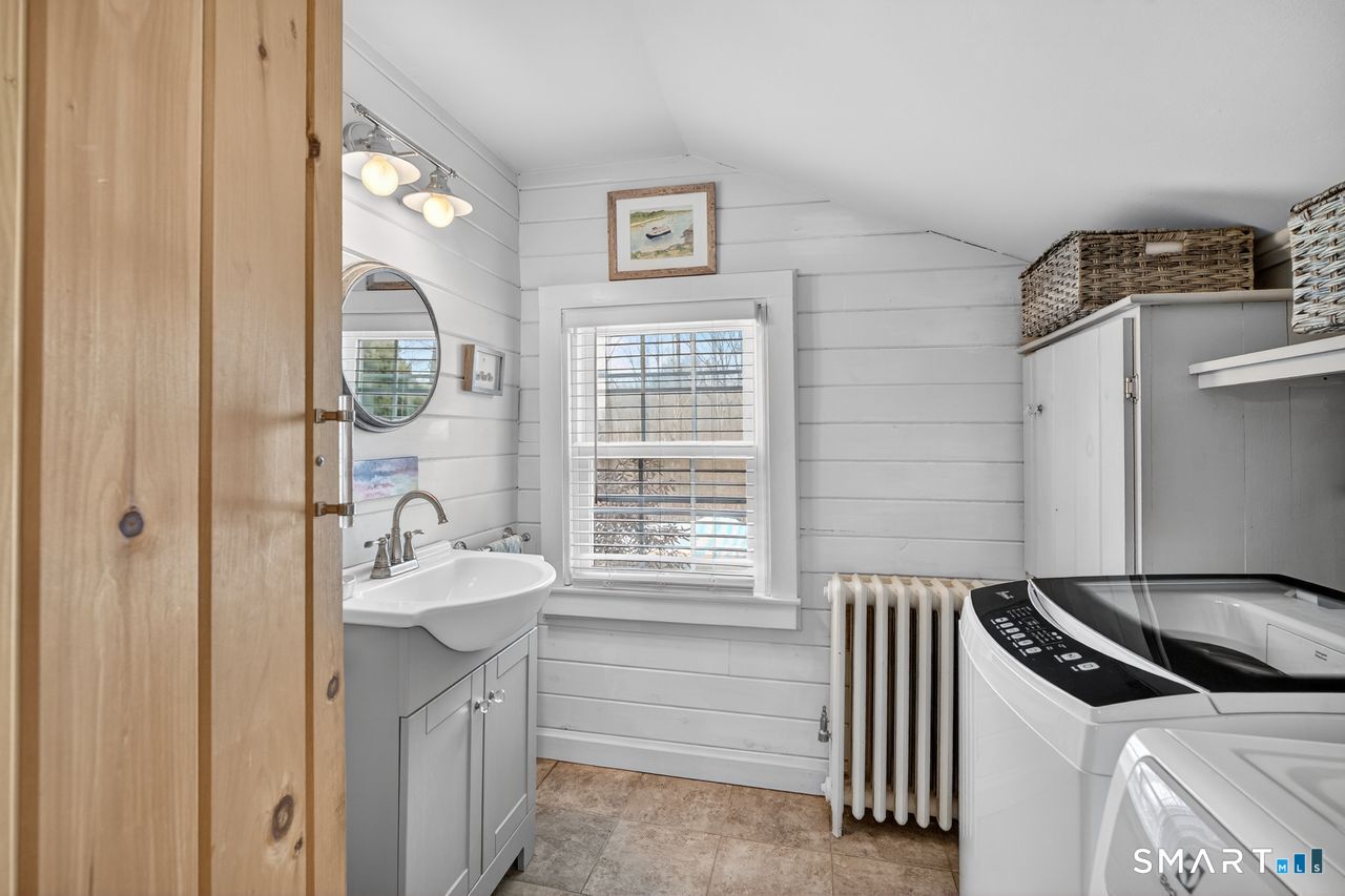 279 Roast Meat Hill Road Killingworth, CT 06419 - Photo 8 of 24 Half bath and laundry off the kitchen.