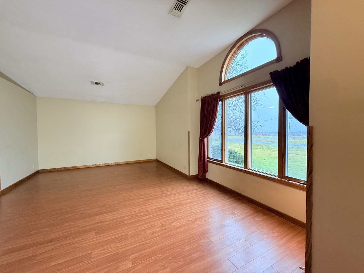 101 East 10th Street Gridley, IL 61744 - Photo 5 of 17 a view of an empty room with glass door