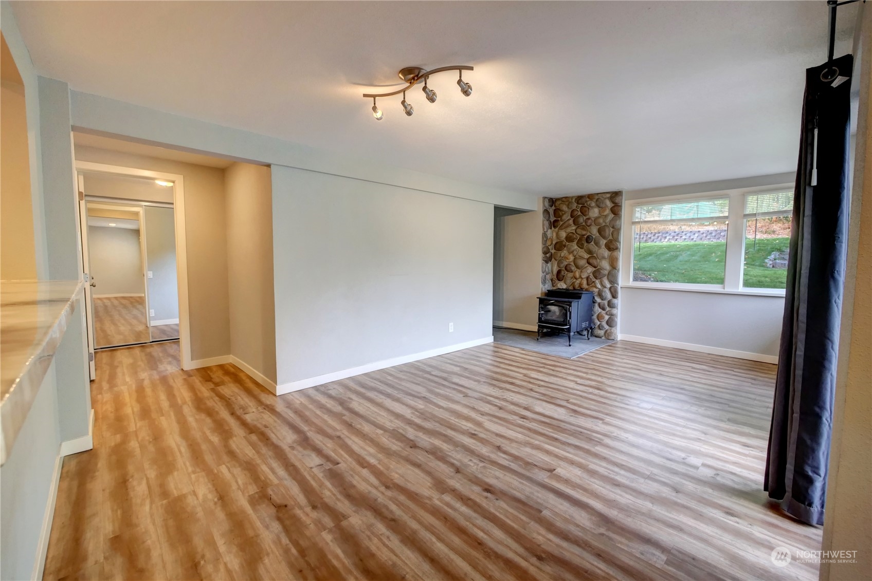 26 Middle Lane Road Omak, WA 98841 - Photo 5 of 38 a view of empty room with wooden floor