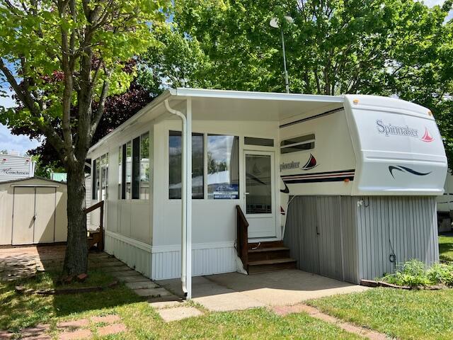 10020 Musson Road, Unit 155 Six Lakes, MI 48886 - Photo 1 of 54 Front View 1