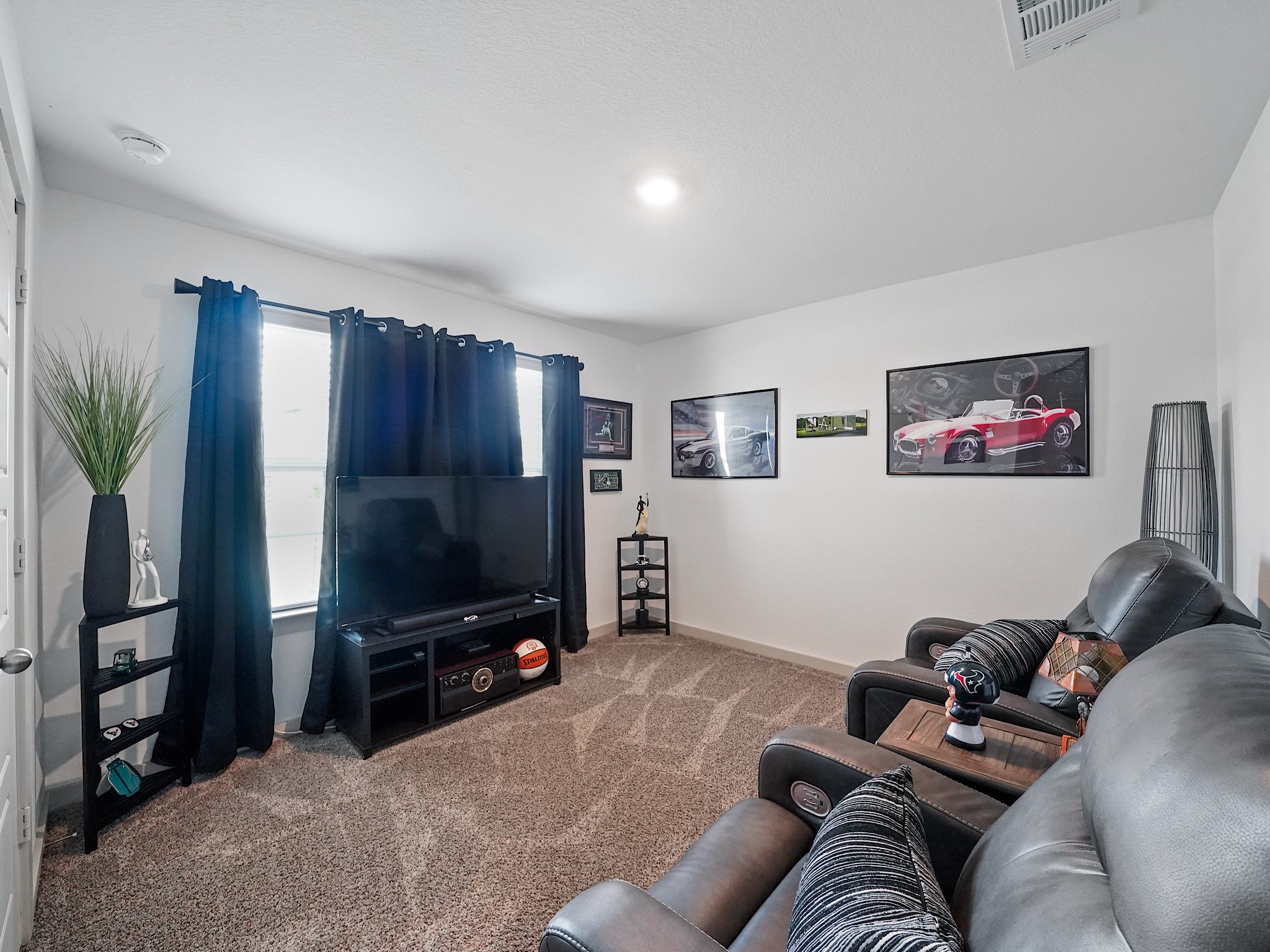 7823 Cattlewood Pass Rosharon, TX 77583 - Photo 3 of 17 Bedroom, currently being used as a media room! As you can see this space can truly be multi functional.