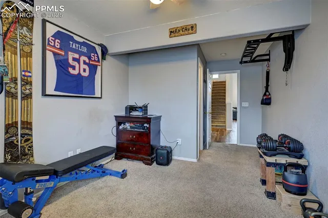 a bedroom with furniture and a window
