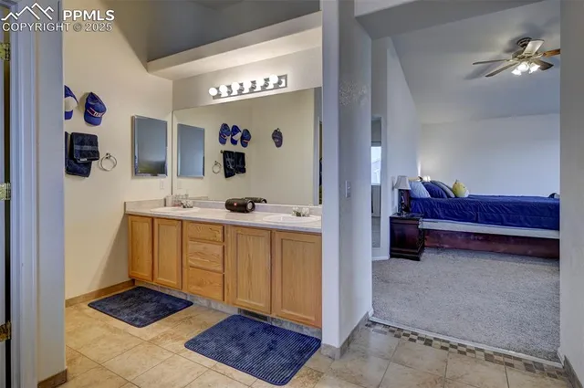 a living room with furniture and a dresser