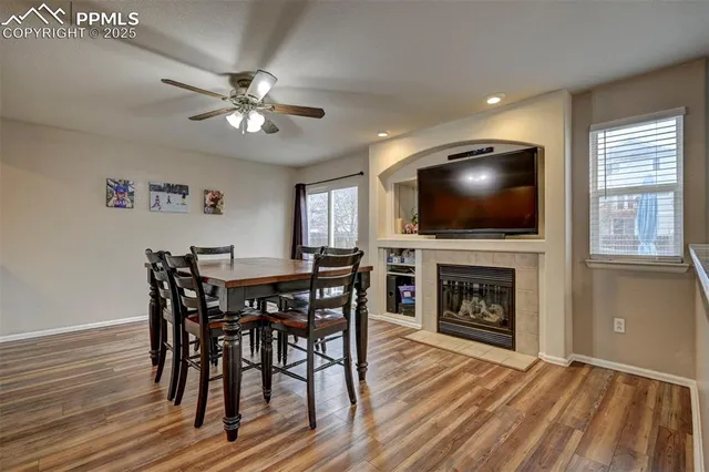 a view of a livingroom with furniture and a fireplace