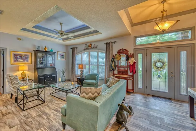 a living room with furniture and a window