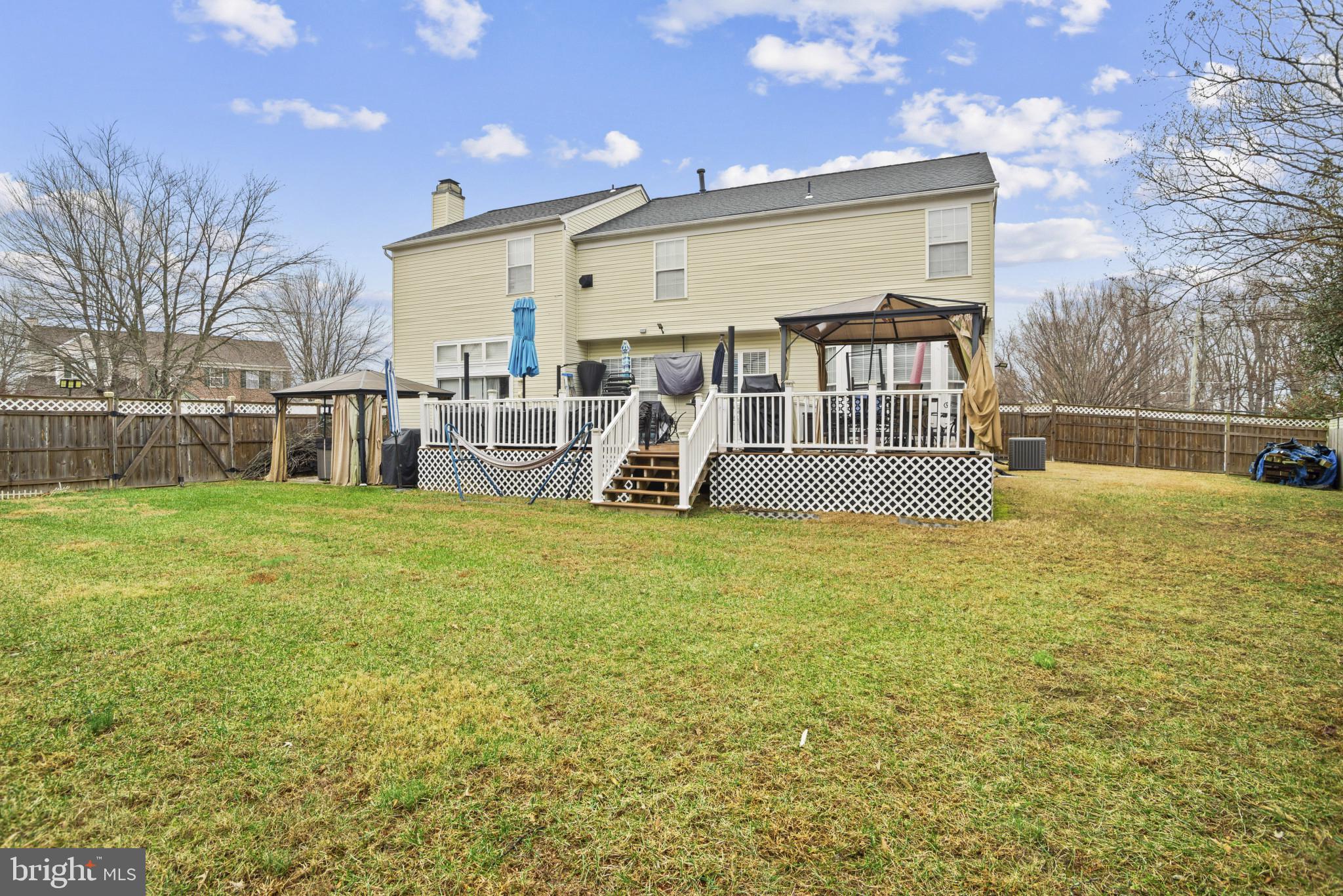 500 Treehouse Court Fort Washington, MD 20744 - Photo 24 of 25 a view of a house with a yard and sitting area
