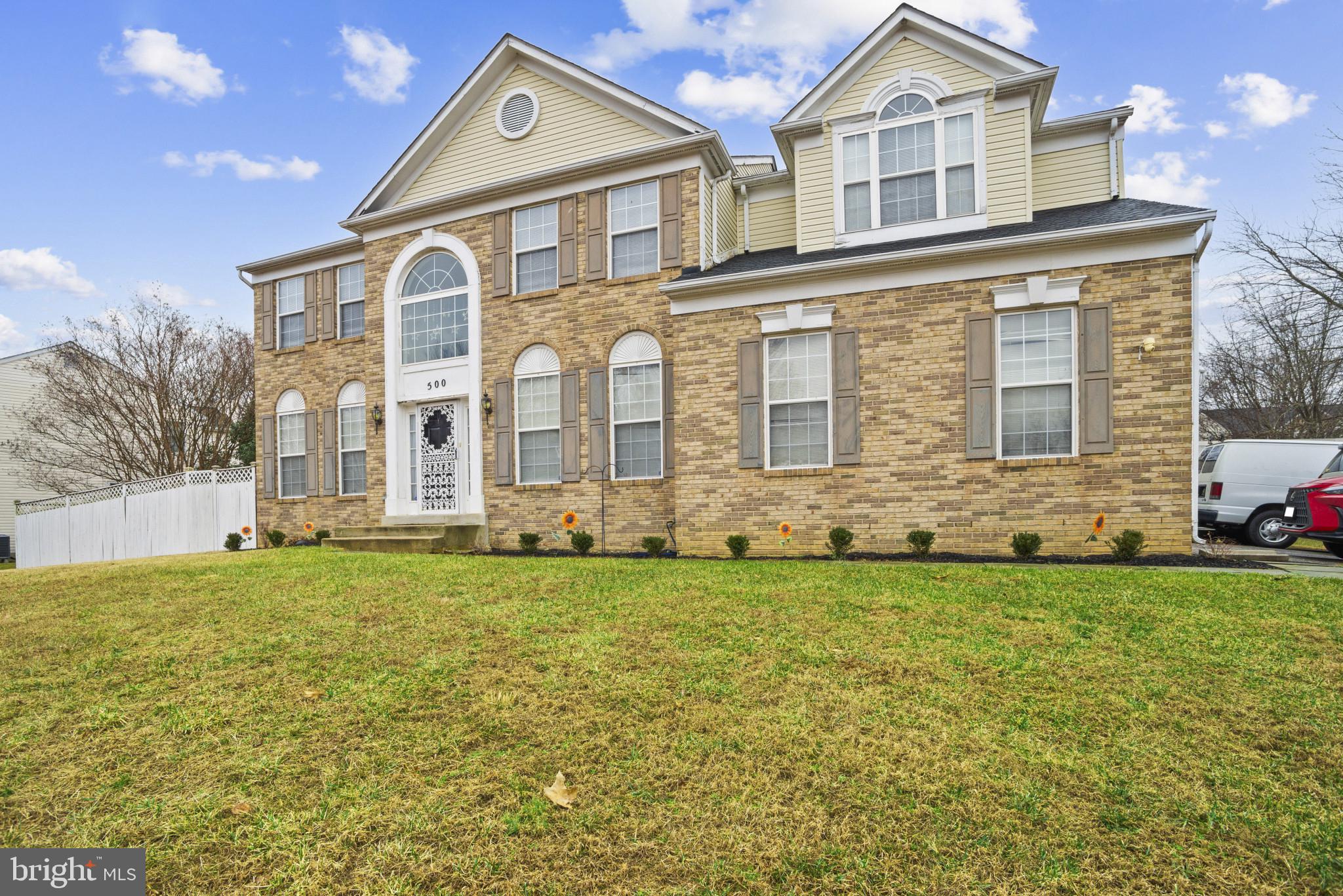 500 Treehouse Court Fort Washington, MD 20744 - Photo 3 of 25 a front view of a house with a yard