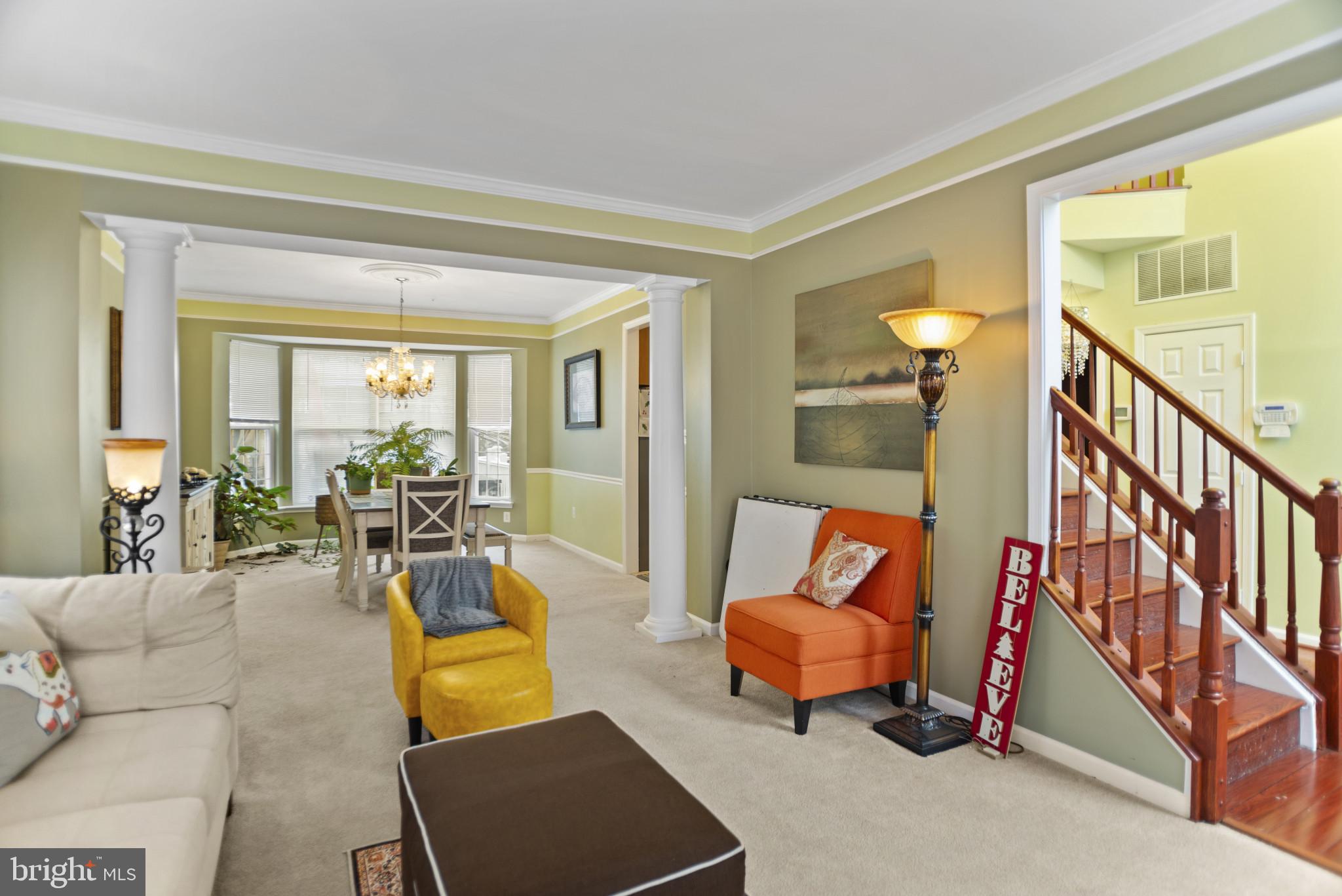 500 Treehouse Court Fort Washington, MD 20744 - Photo 5 of 25 a living room with furniture and a wooden floor