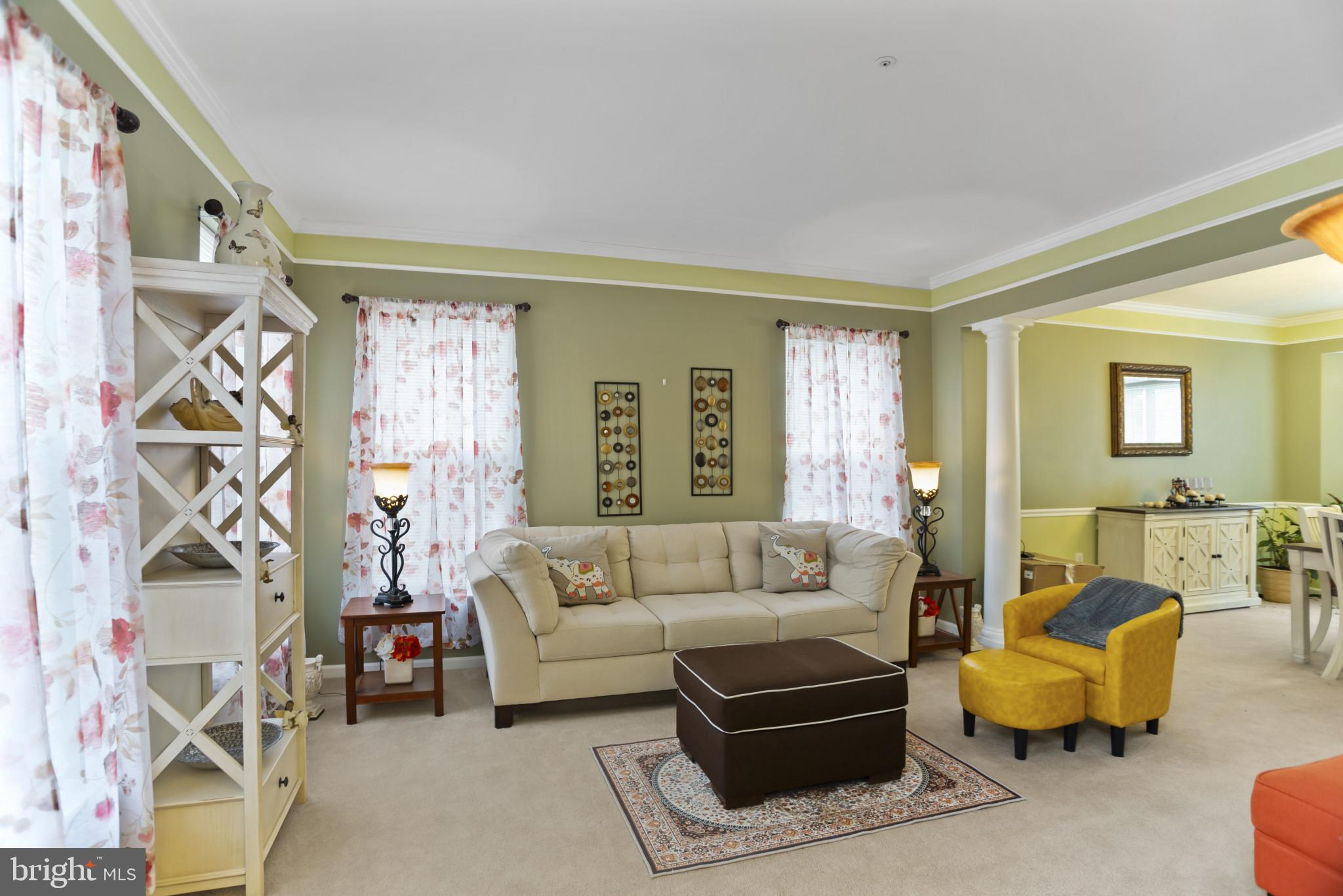 500 Treehouse Court Fort Washington, MD 20744 - Photo 6 of 25 a living room with furniture and a large window
