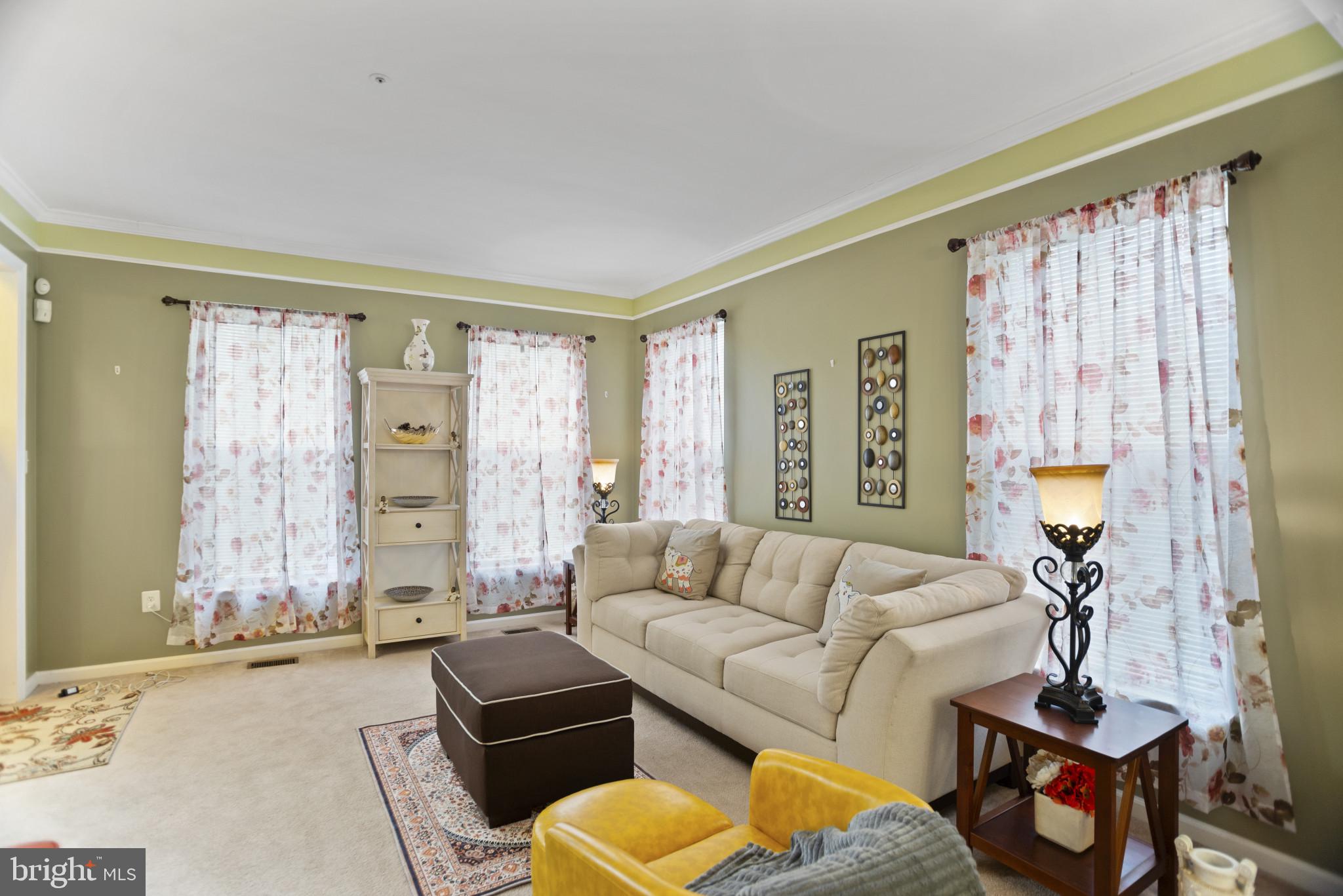 500 Treehouse Court Fort Washington, MD 20744 - Photo 7 of 25 a living room with furniture and a large window