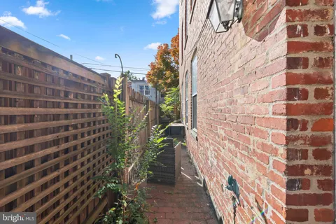 a view of a pathway with a building in the background