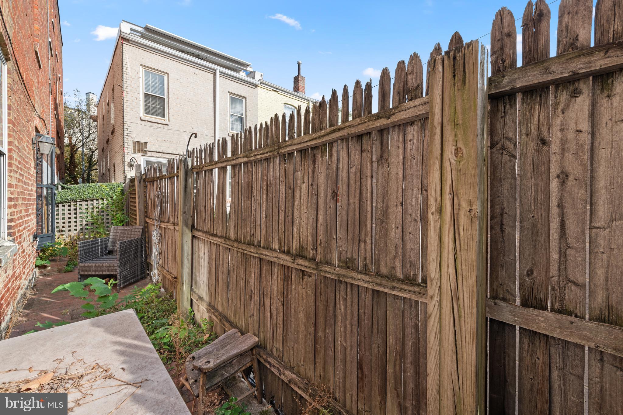 117 E Street Southeast, Unit 103 Washington, DC 20003 - Photo 19 of 19 a view of a wooden fence