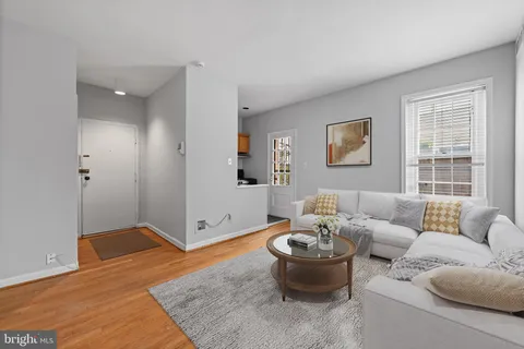 a living room with furniture and window