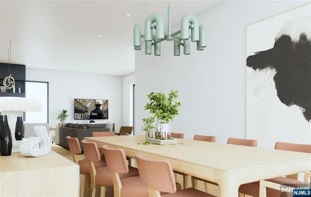 a dining room with furniture and potted plants