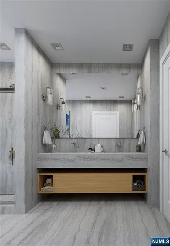 a bathroom with a double vanity sink and a mirror
