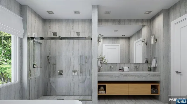 a bathroom with a sink and mirror