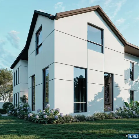 a view of a house with backyard and garden