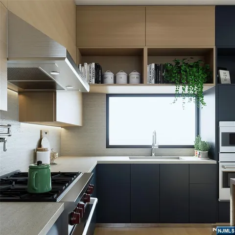 a kitchen with a sink and cabinets