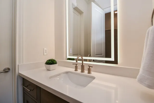 a view of a bathroom with a glass door