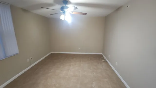 a view of a room with a flat screen tv