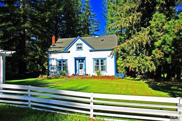 3950 Harrison Grade Road Sebastopol, CA 95472 - Photo 1 of 1 a front view of a house with a yard