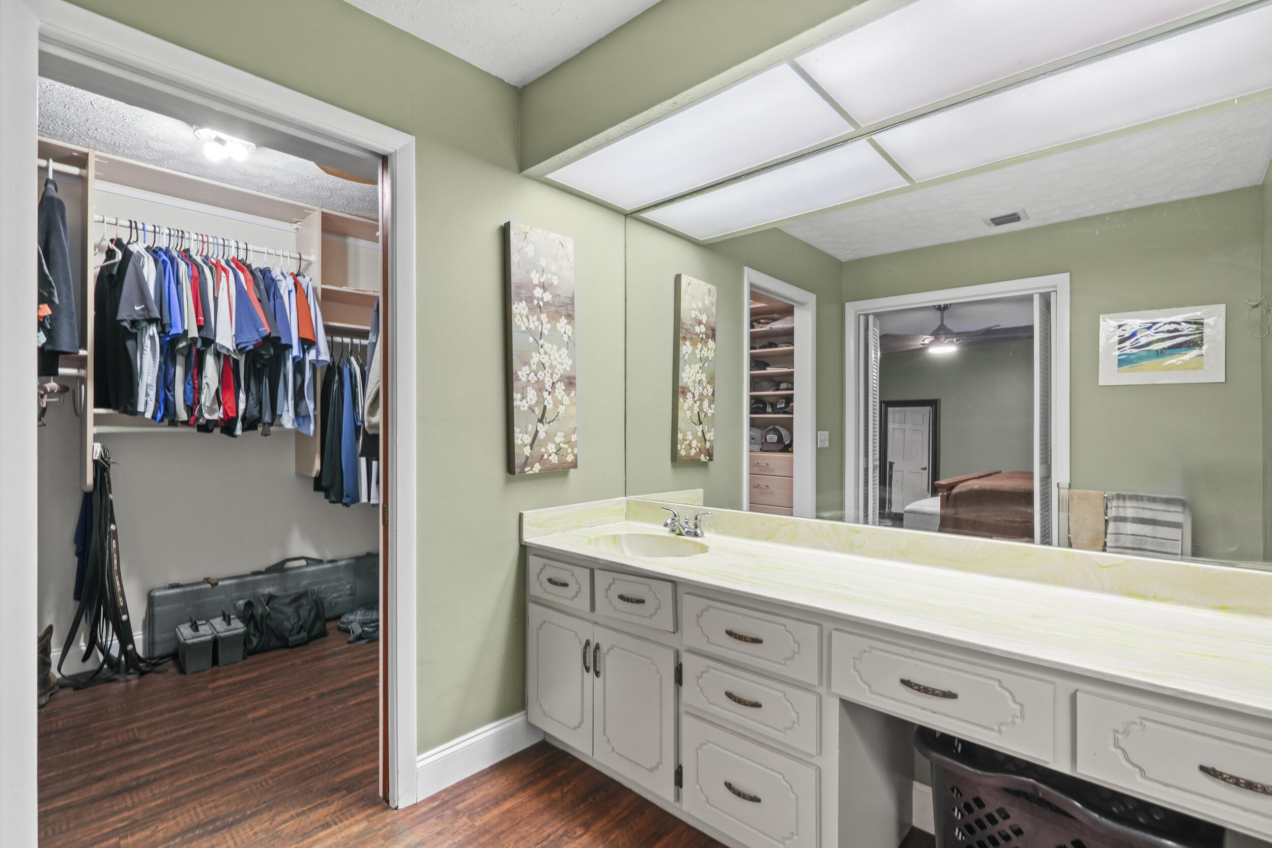4170 McCarty Road Fort Pierce, FL 34945 - Photo 34 of 57 a spacious bathroom with a double vanity sink and a mirror
