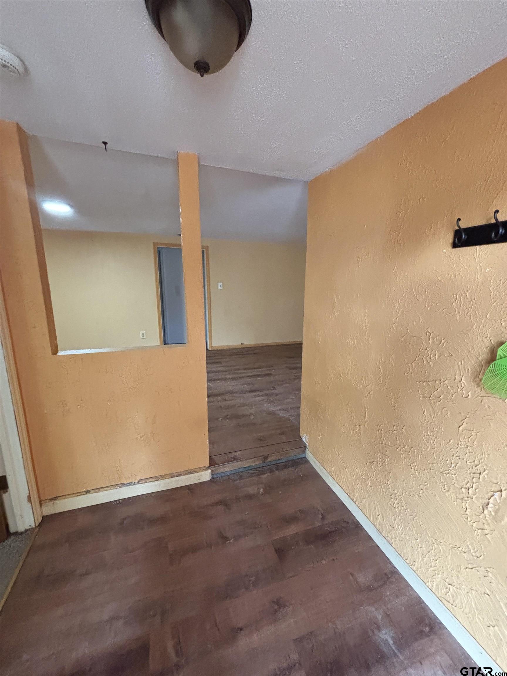 8123 Cherokee Trace Gilmer, TX 75644 - Photo 8 of 26 a view of an empty room