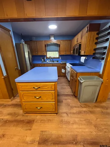 a room with furniture and stairs