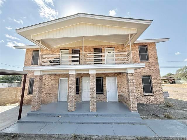 1109 Jackson Street Zapata, TX 78076 - Photo 1 of 30 a front view of a house